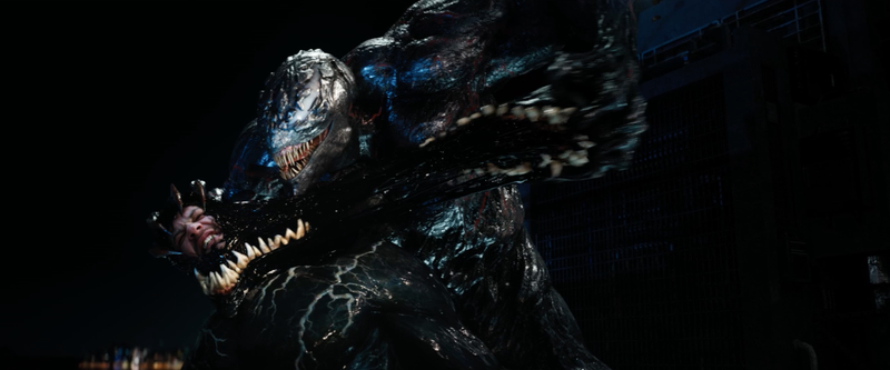 Riot tearing Venom from Eddie Brock’s face.